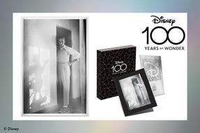 This 5g pure silver coin note is fully engraved to show one of the most iconic images of Walt Disney. He is seen standing in a doorway as the shadow of Disney’s Mickey Mouse reflects off the wall. On the back is the Disney logo.