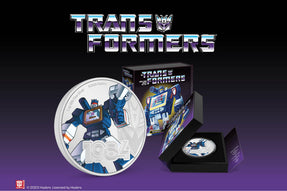 This 1oz pure silver coin features Soundwave as seen in his 1984 debut, highlighting his cassette recorder detailing and striking blue and silver colour! The year and Transformers logo have been engraved with relief and a frosted finish.