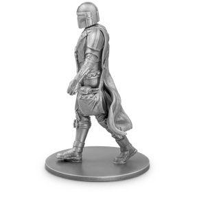 The Mandalorian™ – Series 1 150g Silver Miniature in Full Mandalorian Armour, Walking with the Child in a Side Satchel and Weapon in Hand.