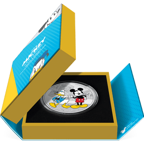 Disney Mickey & Friends – Mickey & Donald 3oz Silver Coin Featuring Book-style Packaging with Coin Insert and Certificate of Authenticity Sticker and Coin Specs.