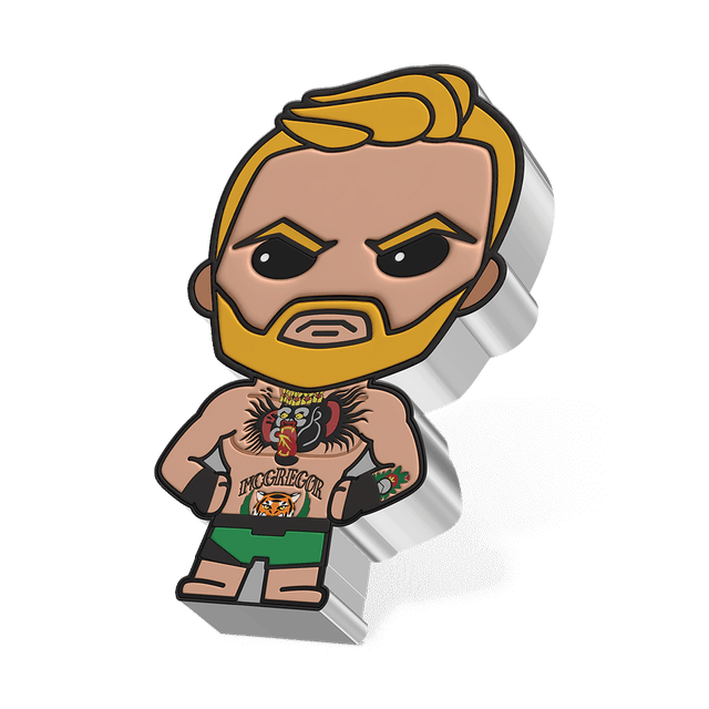 UFC® – Conor McGregor 1oz Silver Chibi® Coin in His Blonde Beard, Hair and Quiff, Green Shorts and Bare Chest Showcasing His Iconic Tiger and Traditional Gorilla Head Tattoo. His Hands are on His Hips.