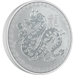 The 1oz Silver Year of the Dragon Coin 2024 features the image of a Dragon and Pearl juxtaposed against clouds in the sky. The Traditional Chinese character for "dragon" is also included on the coin reverse along with the metal weight and quality. The entire design is framed by an ornate border. 