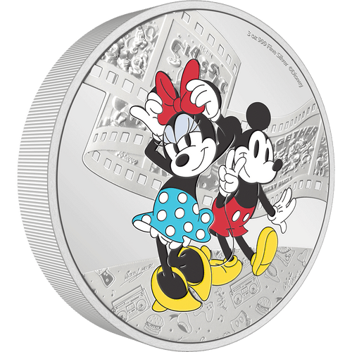 The adorable sweethearts are shown in colour and wearing their iconic outfits. A frosted film scroll runs behind them showing some of the pair’s fun times and engraved along the bottom are some adorable motifs. A mirror finish completes the design.