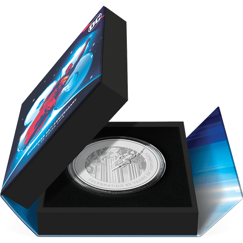 SUPERMAN™ 85th Anniversary 3oz Silver Coin Featuring  Book-style Packaging with Coin Insert and Certificate of Authenticity Sticker.